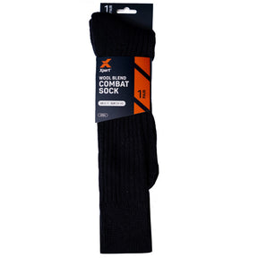A pair of black Xpert Combat Sock in retail packaging, featuring a dark gray cardboard header and a black and orange paper sleeve label.