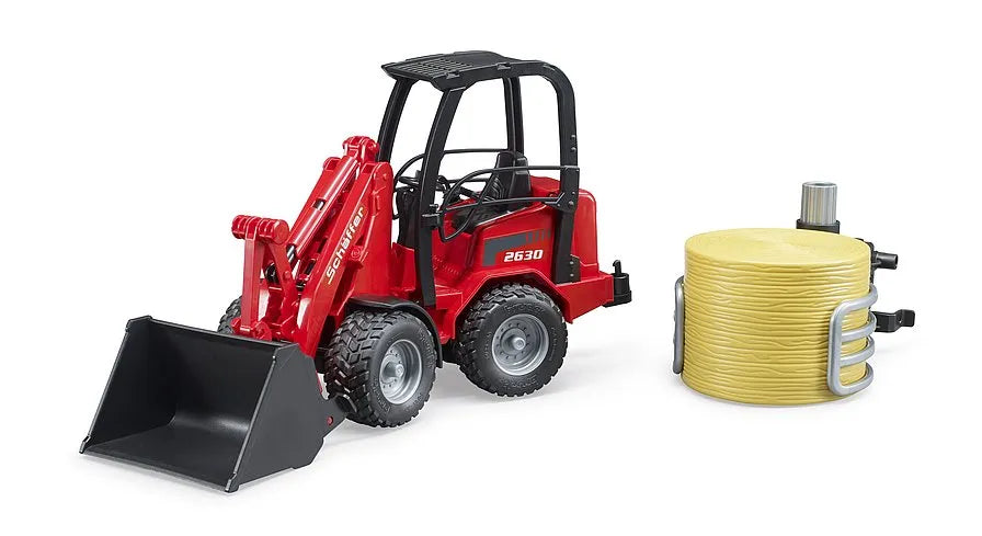Bruder Schäffer Compact loader with bale gripper + bale