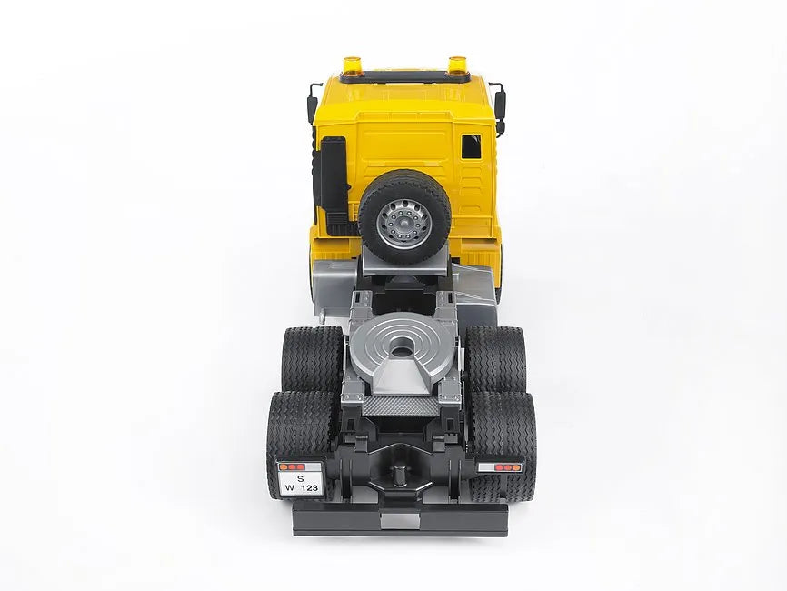 Bruder MAN TGA Low Loader with Backhoe Loader